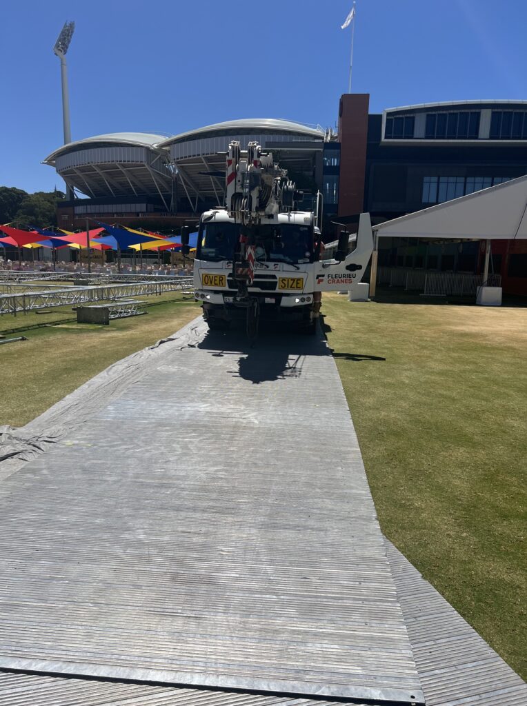 Temporary access road supporting crane